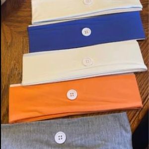 NEW, Set of. 5 headbands with buttons on side.